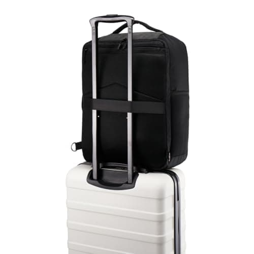 Sac à dos cabine noir sur valise blanche