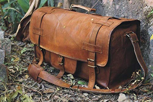 Sac de voyage vintage en cuir marron avec lanières