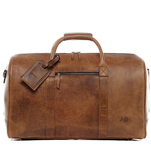 Beau sac de voyage en cuir cognac pour prendre l'avion